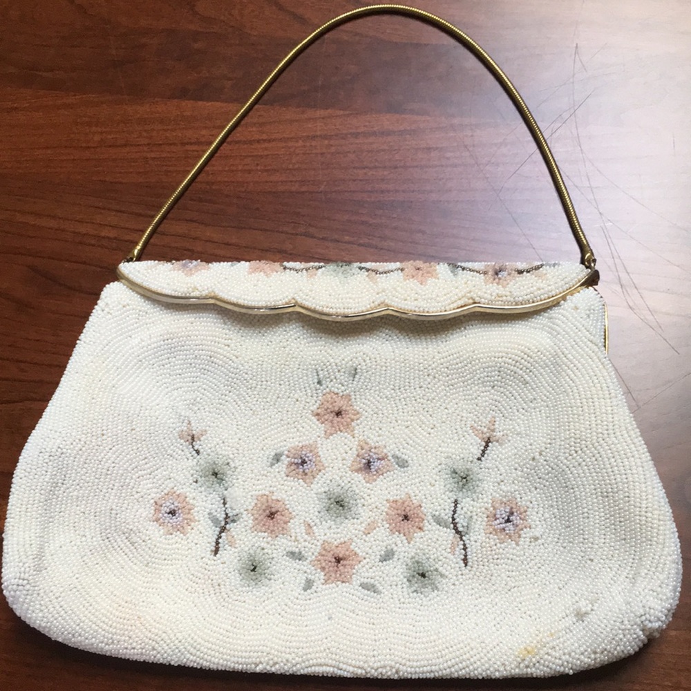 Beaded clutch with small metal handle